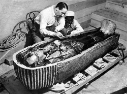 Photo of Howard Carter opening Tutankhamun's sarcophagus